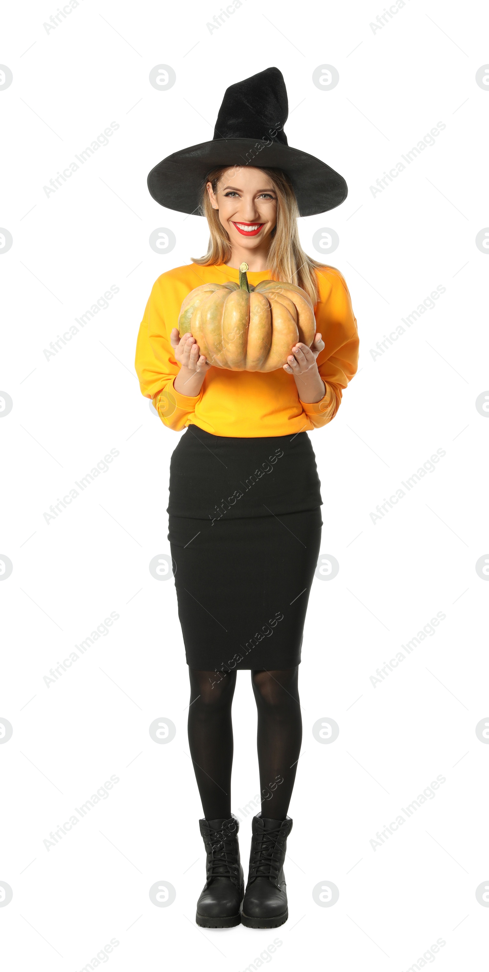 Photo of Beautiful woman wearing witch costume with pumpkin for Halloween party on white background