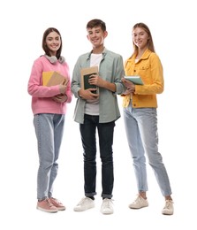 Photo of Group of teenage students with stationery on white background