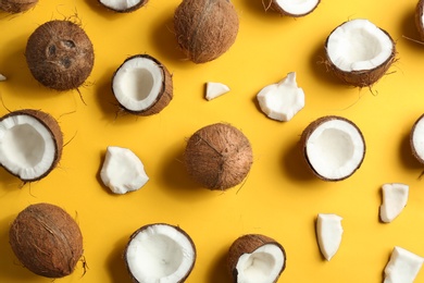 Coconut pattern on color background, flat lay