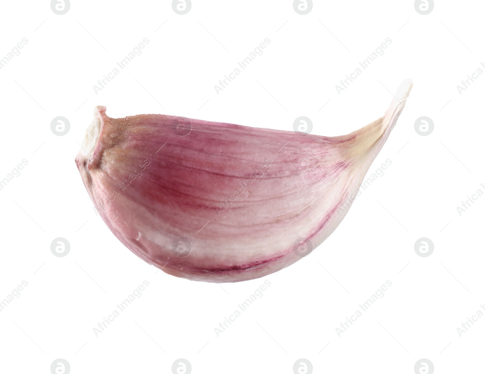 Photo of One unpeeled garlic clove isolated on white