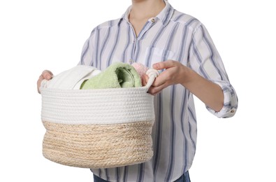 Photo of Woman with basket full of clean laundry on white background, closeup