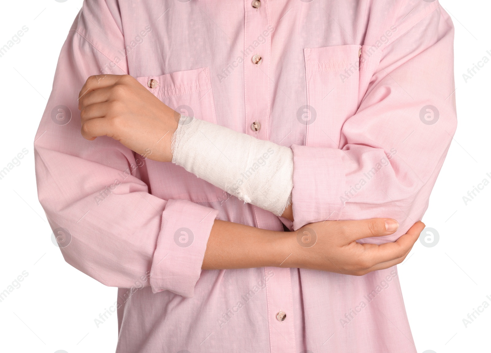 Photo of Woman with wrist wrapped in medical bandage on white background, closeup