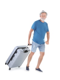 Senior man with suitcase on white background. Vacation travel