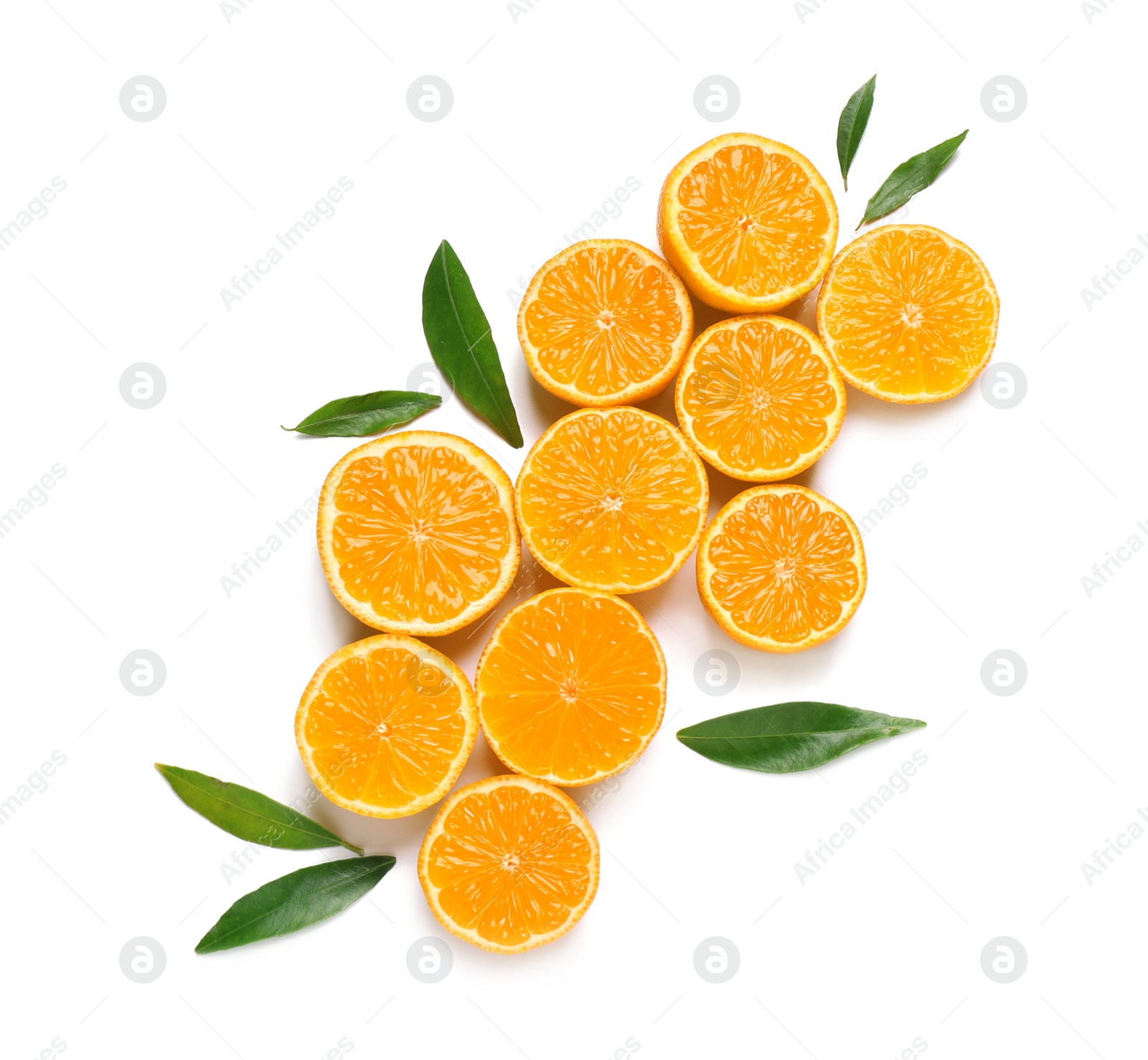 Photo of Composition with halves of fresh ripe tangerines and leaves on white background, top view. Citrus fruit