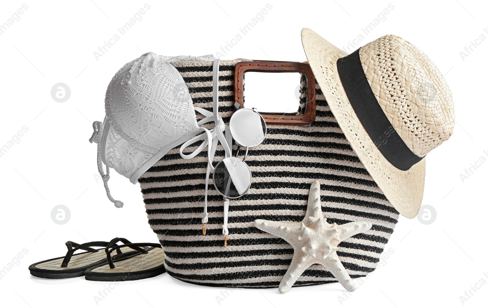 Photo of Set of beach accessories on white background