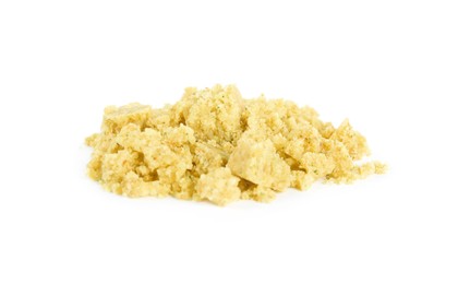 Aromatic crumbled bouillon cube on white background