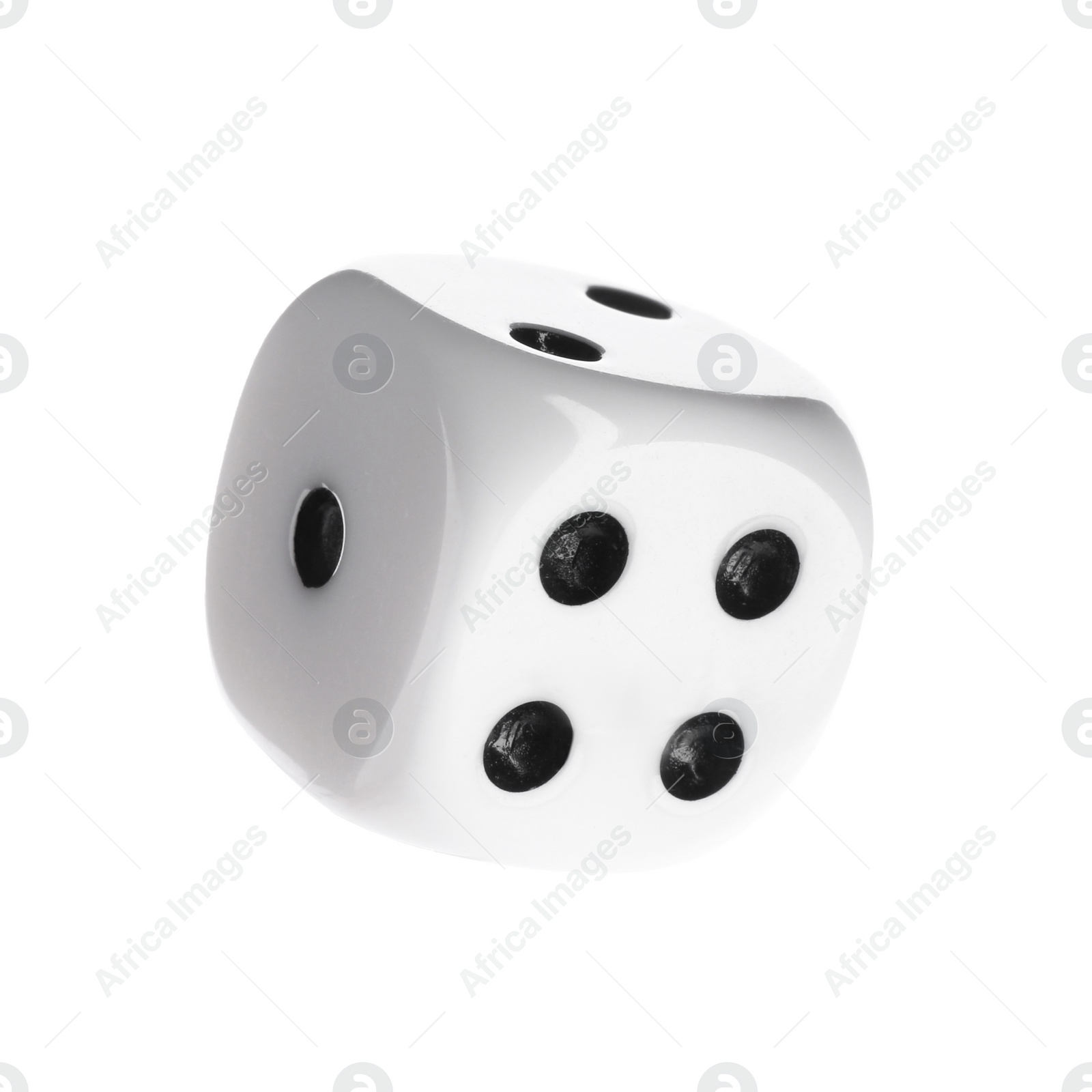 Photo of One plastic game dice isolated on white