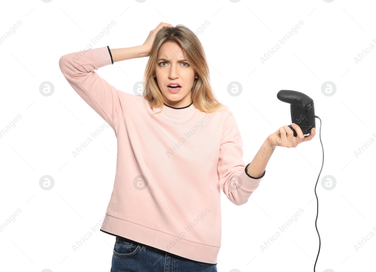 Photo of Emotional young woman playing video games with controller isolated on white