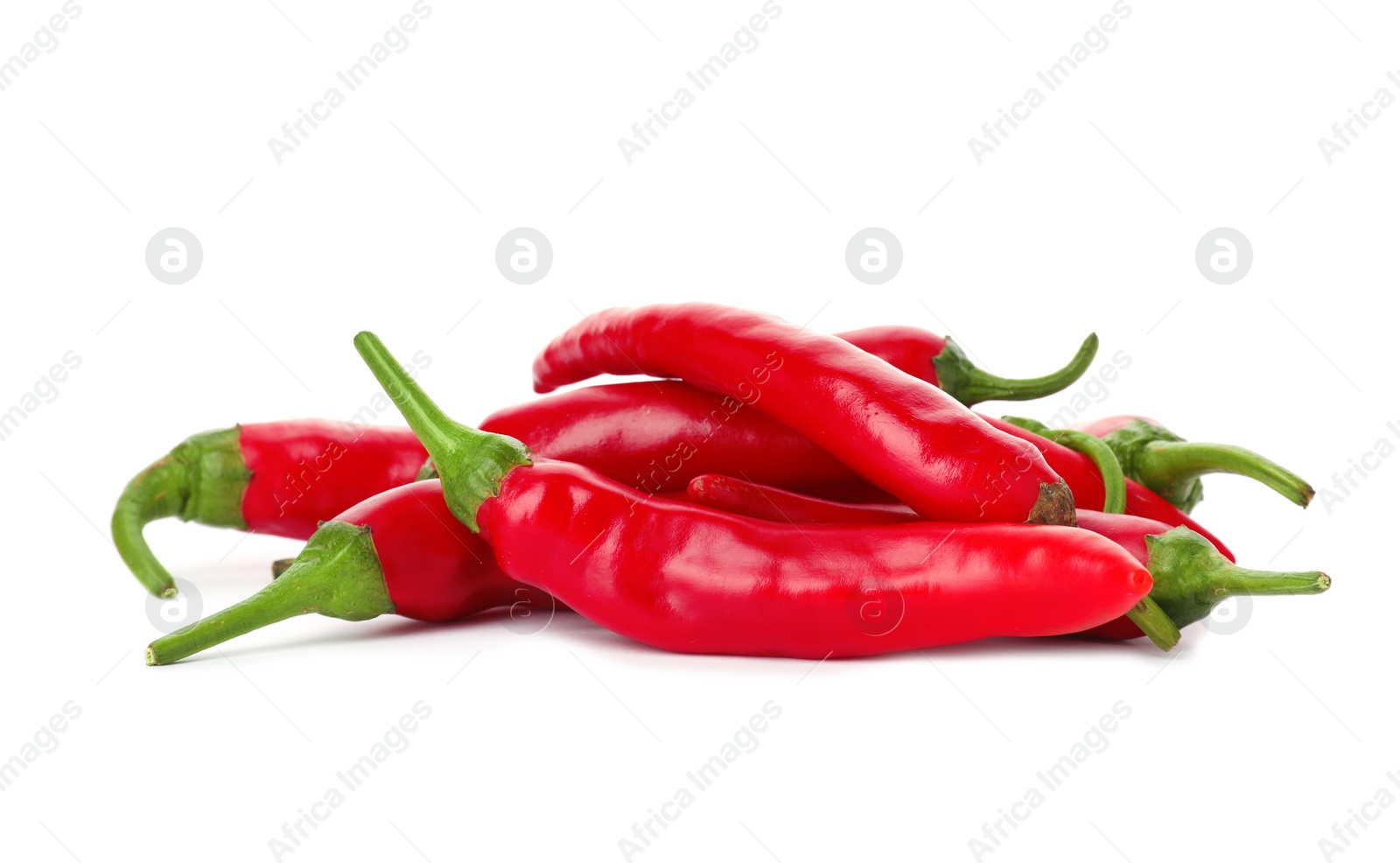 Photo of Heap of red chili peppers on white background