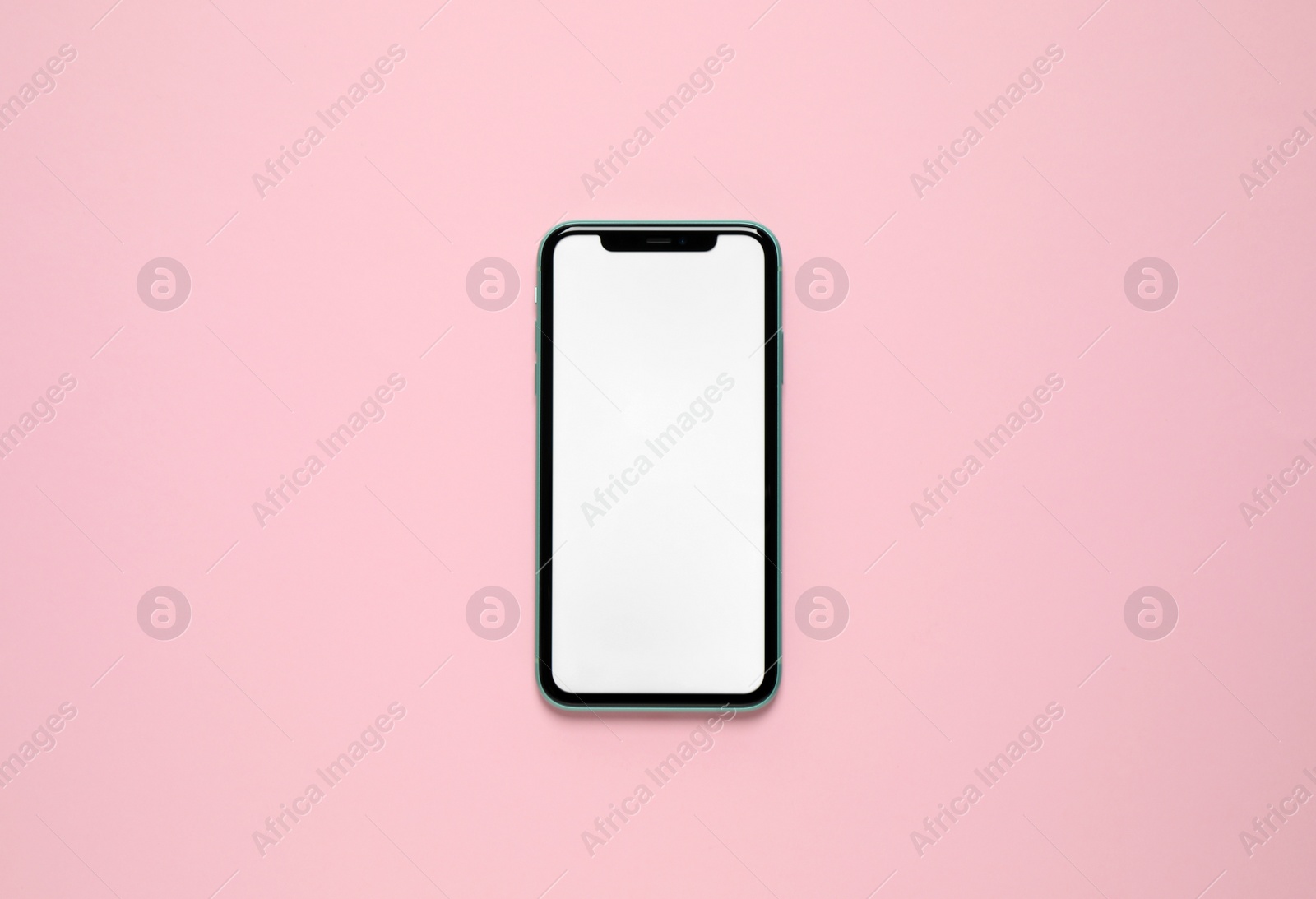 Photo of MYKOLAIV, UKRAINE - JULY 07, 2020: iPhone 11 on pink background, top view. Mockup for design