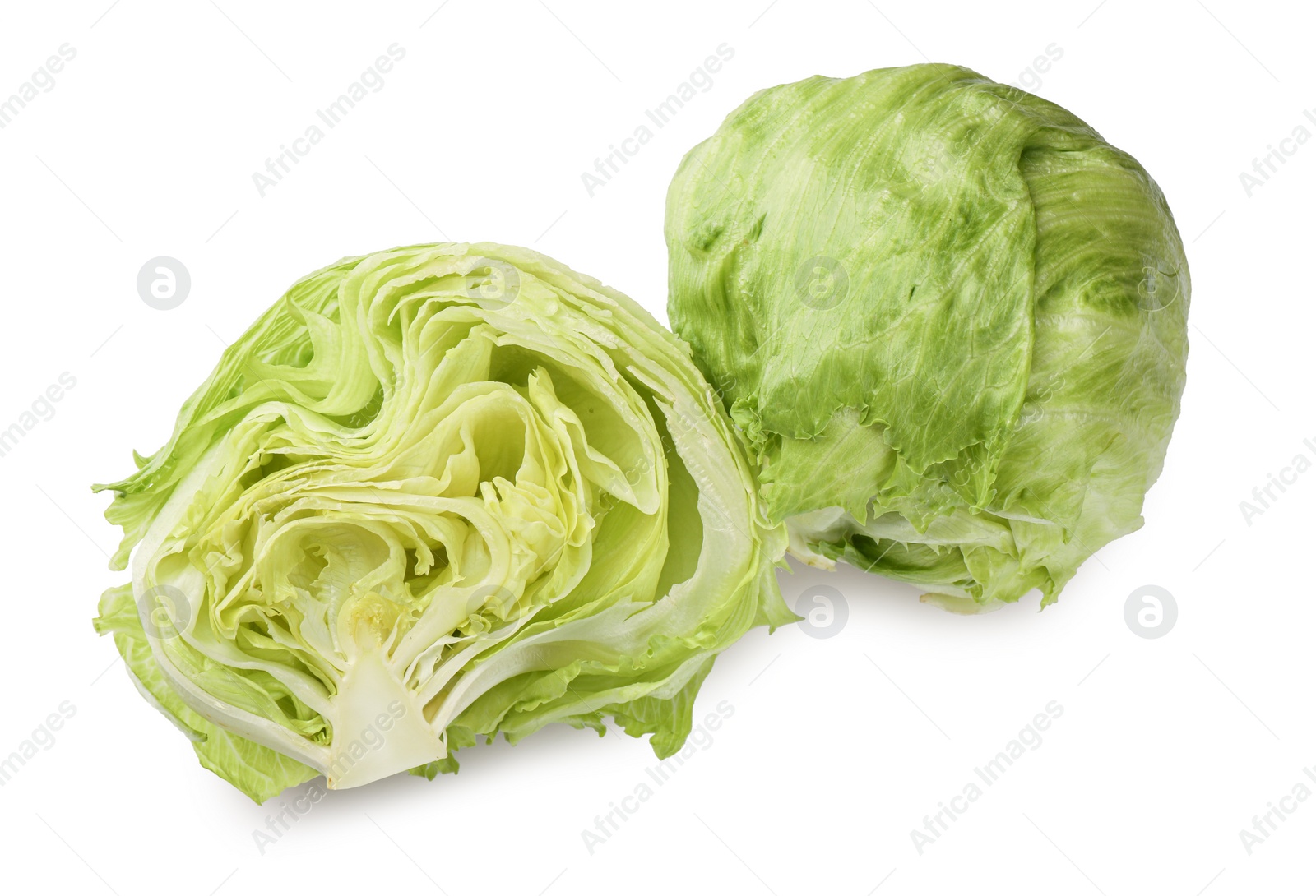 Photo of Whole and cut fresh green iceberg lettuces isolated on white, top view