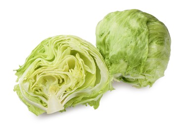 Photo of Whole and cut fresh green iceberg lettuces isolated on white, top view