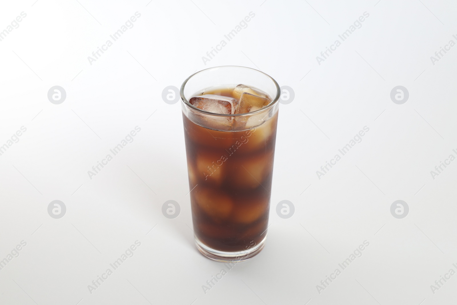 Photo of Iced coffee in glass on white background