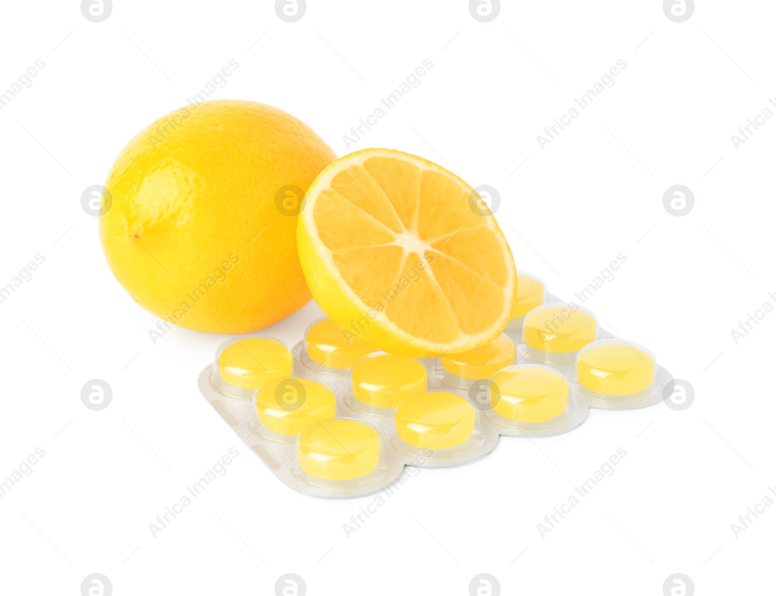 Photo of Fresh lemons and blister with cough drops isolated on white