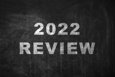 Illustration of Text 2022 Review written on black chalkboard