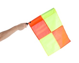 Referee holding linesman flag on white background, closeup