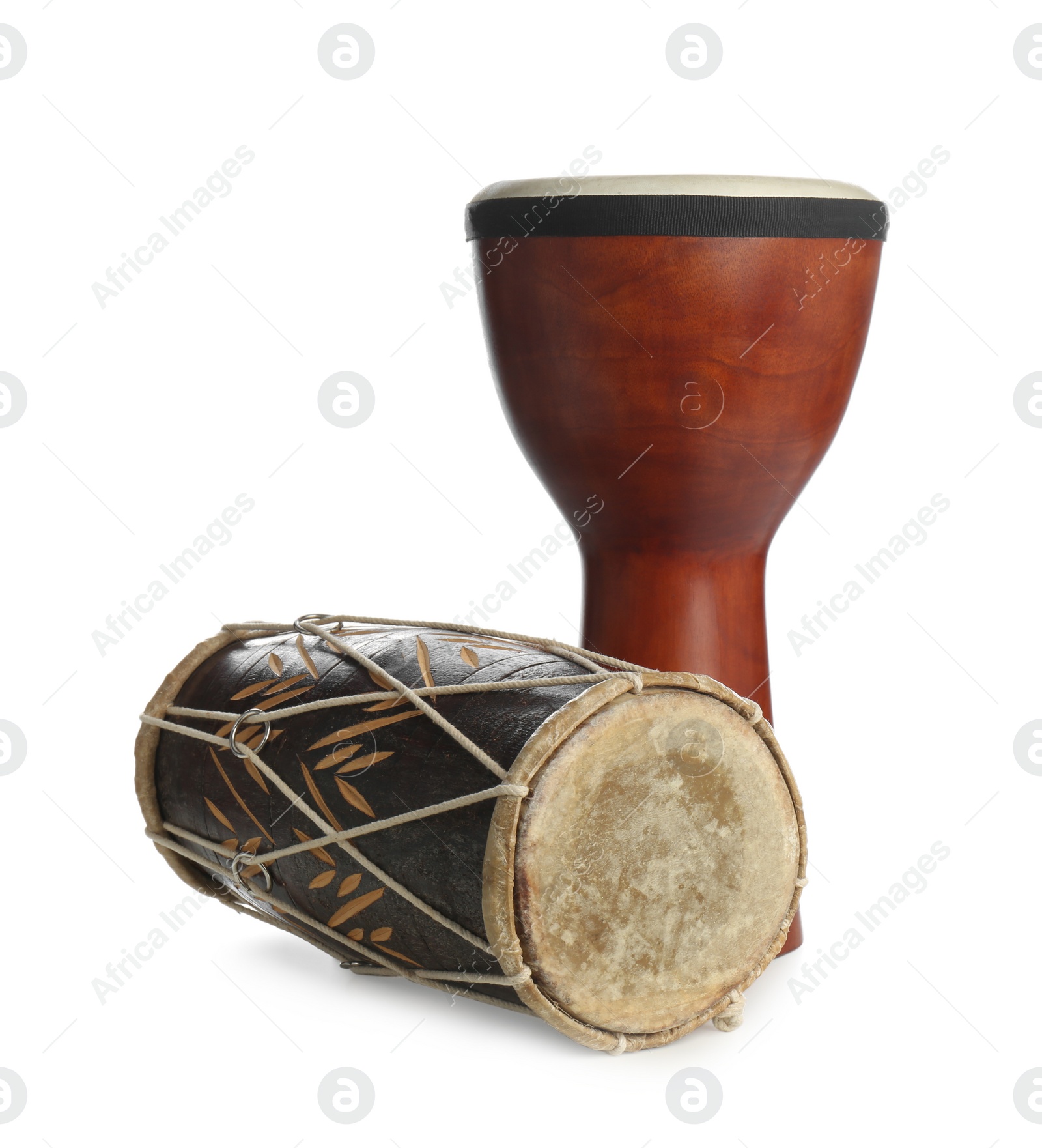 Photo of Vintage hand drums isolated on white. Percussion musical instruments