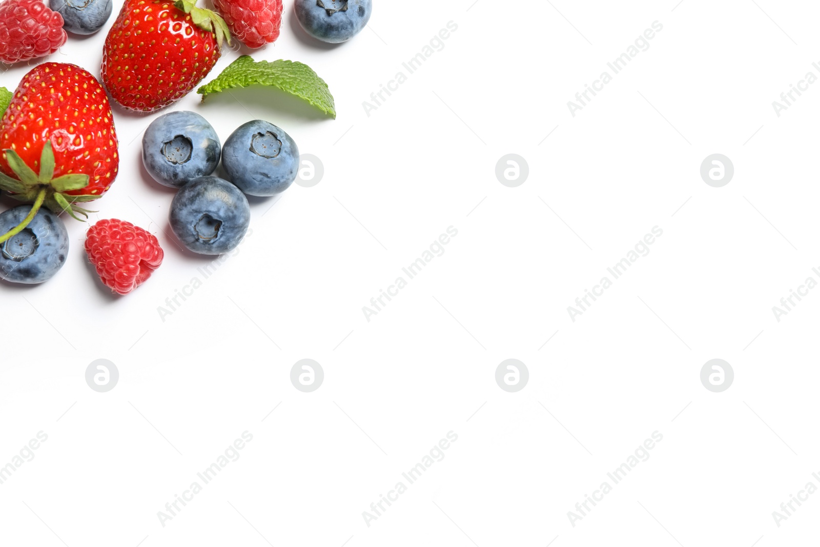 Photo of Mix of fresh berries on white background, flat lay