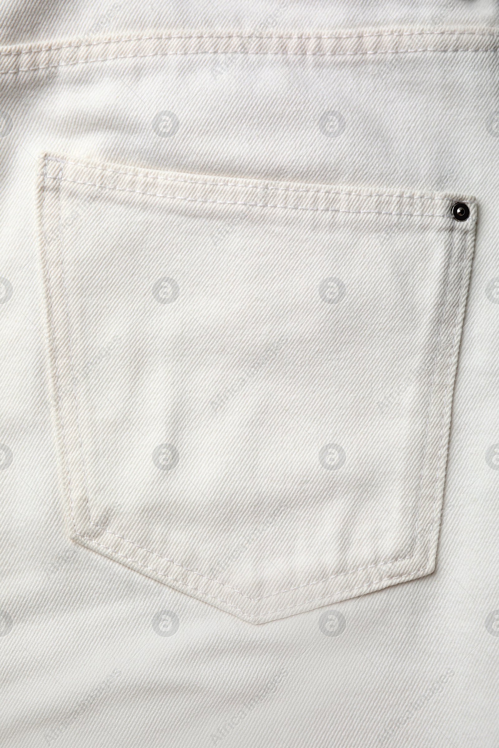 Photo of White jeans with pocket as background, top view
