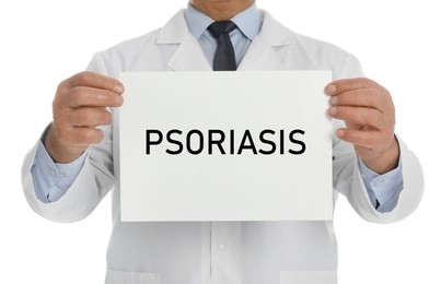 Image of Doctor holding sign with word PSORIASIS on white background, closeup