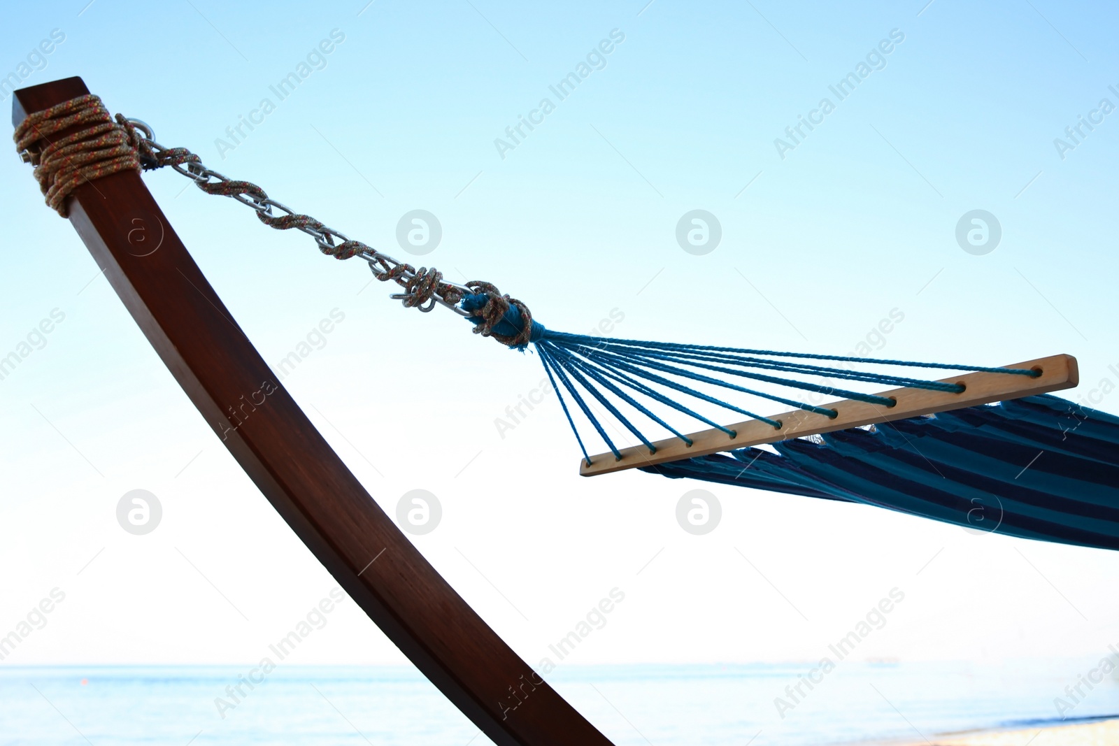 Photo of Comfortable hammock at seaside. Time to relax