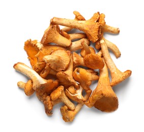 Photo of Fresh chanterelle mushrooms isolated on white, top view