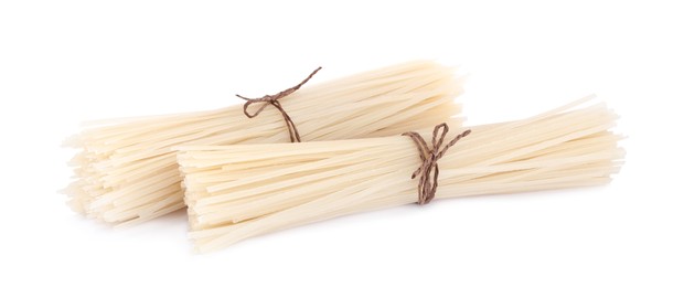 Bunches of dried rice noodles isolated on white