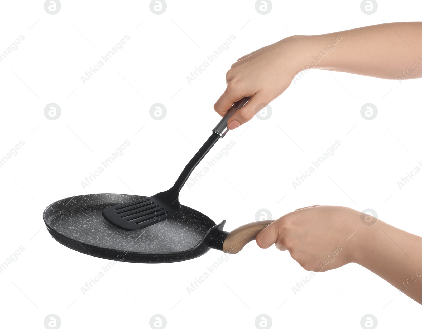 Photo of Woman with spatula and frying pan on white background, closeup