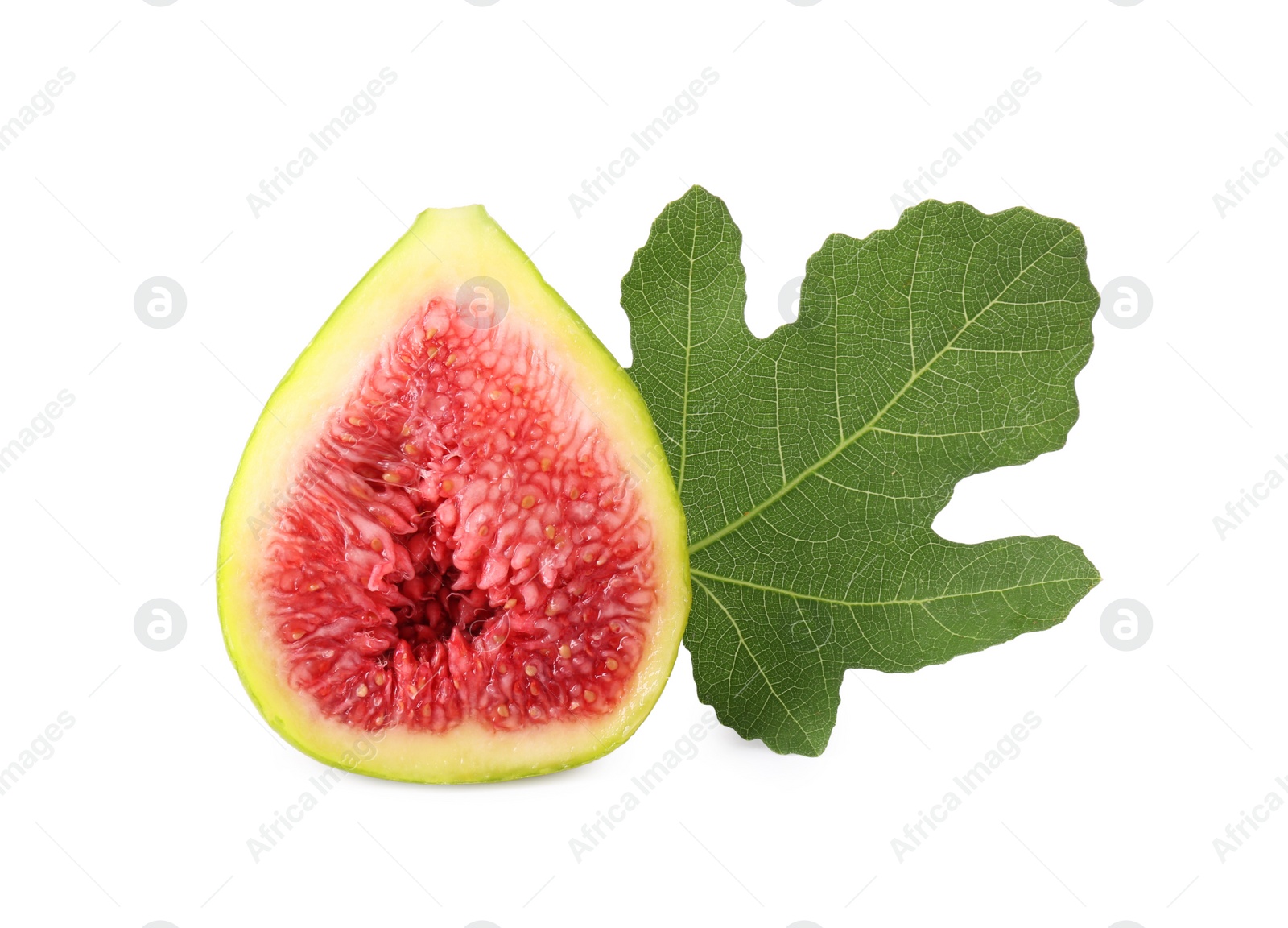 Photo of Half of fresh green fig with leaf isolated on white