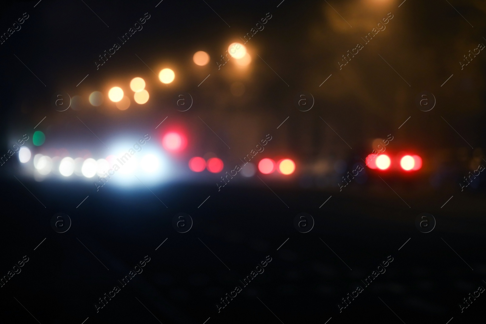 Photo of Blurred view of night city. Bokeh effect