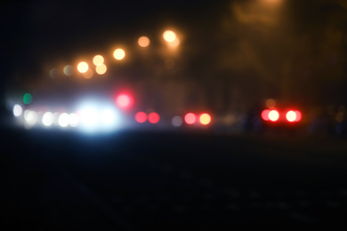 Blurred view of night city. Bokeh effect