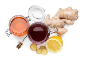 Photo of Cup of tea and different natural cold remedies on white background, top view. Cough treatment