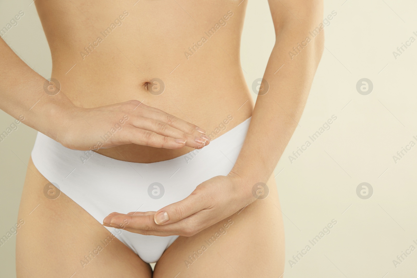 Photo of Gynecology. Woman in underwear on light background, closeup