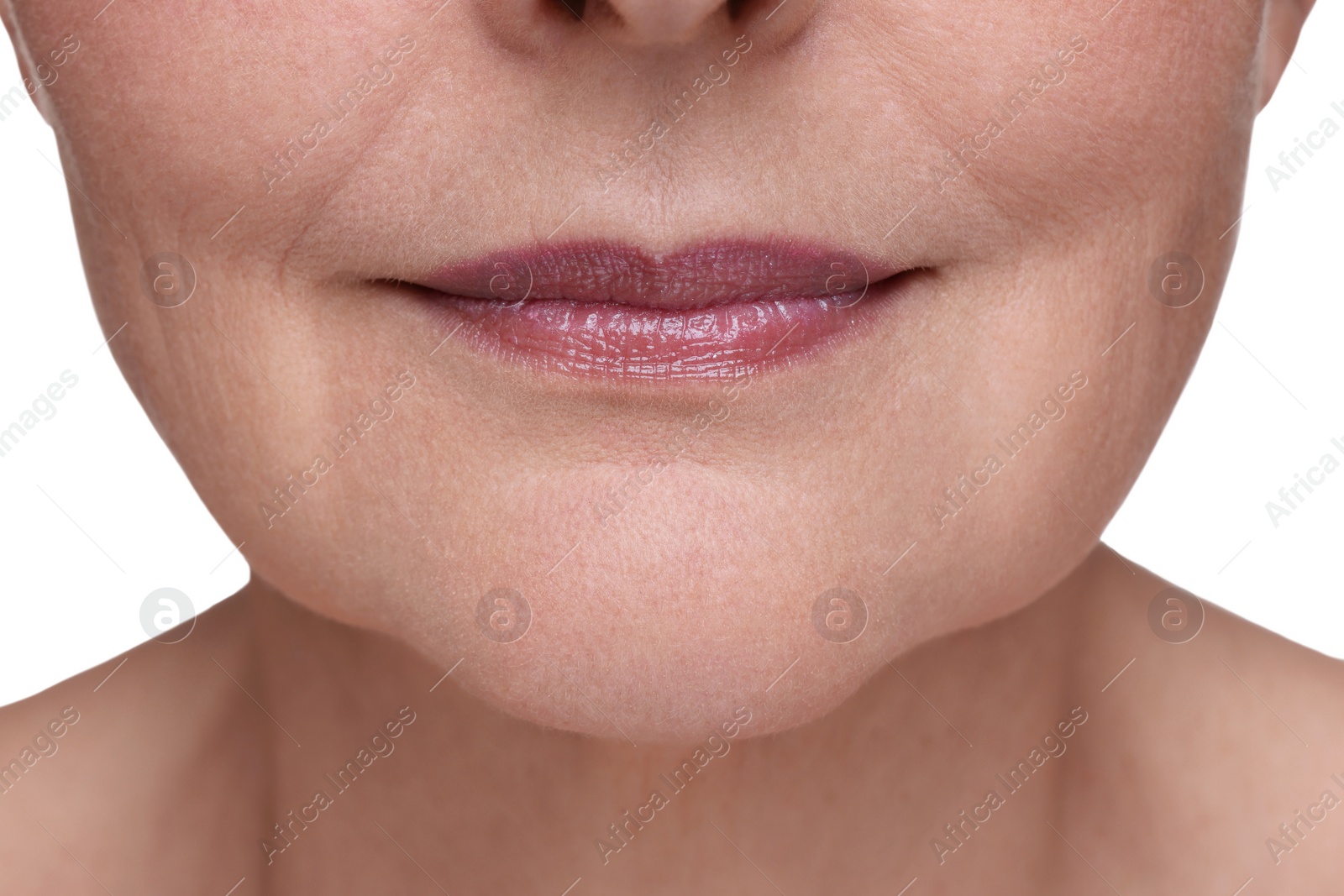 Photo of Senior woman with aging skin on white background, closeup. Rejuvenation treatment