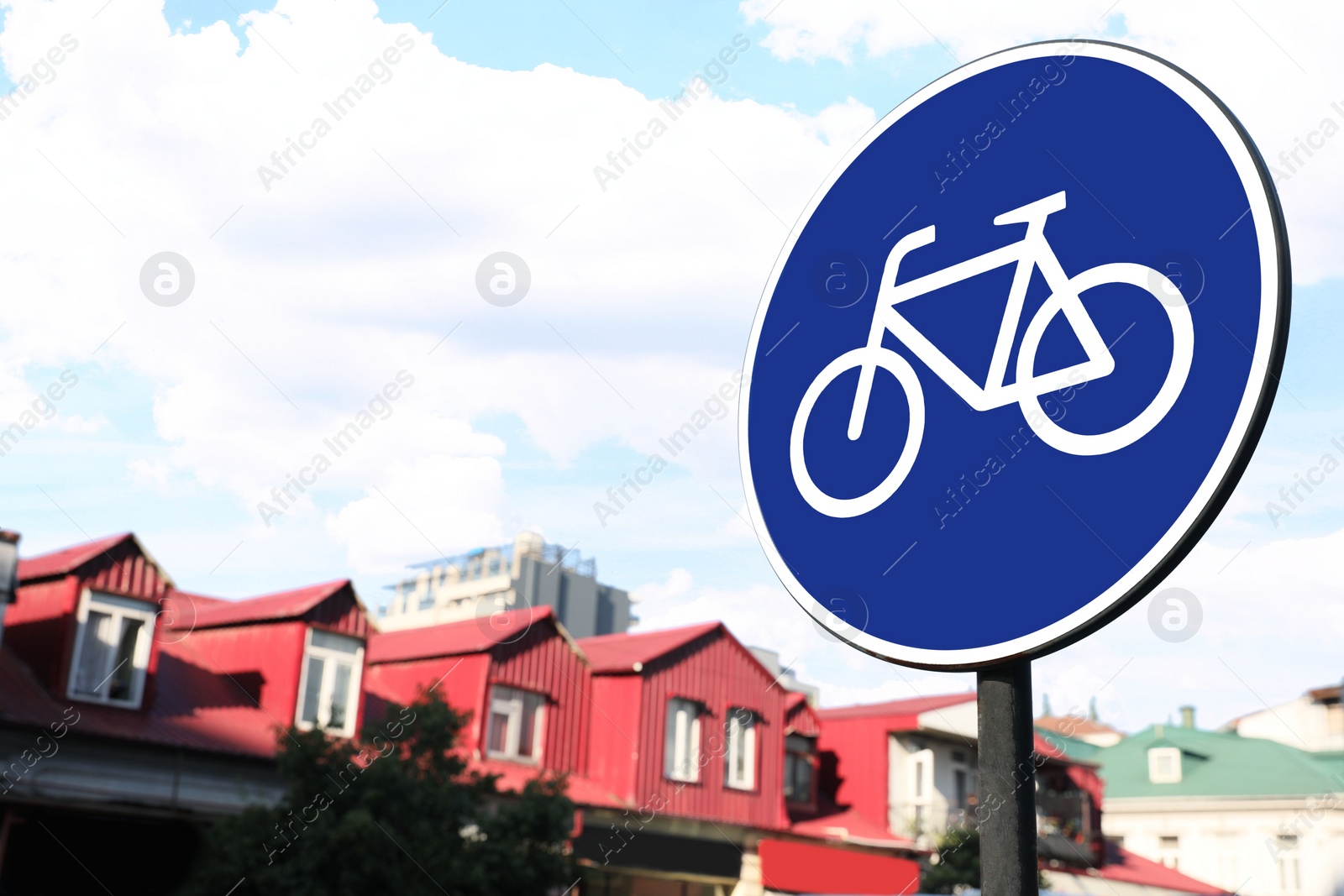 Photo of Road sign Cycleway under blue sky in city