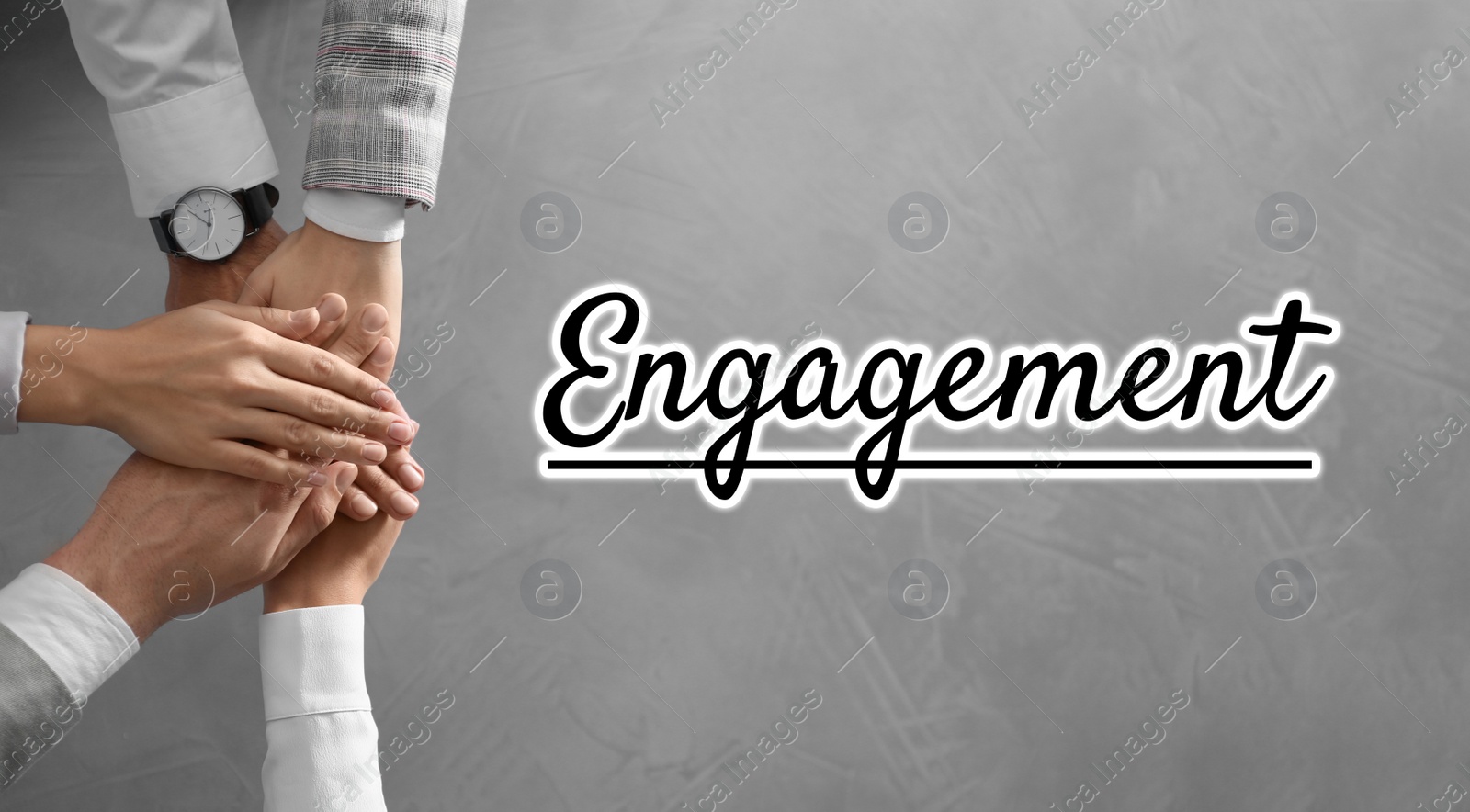 Image of Engagement concept. People holding hands together, top view 