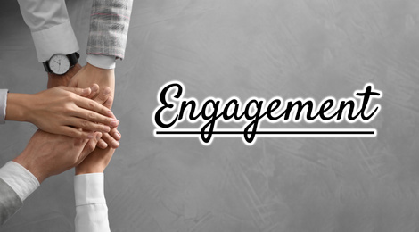 Engagement concept. People holding hands together, top view 