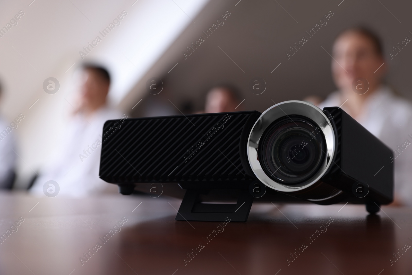 Photo of Video projector on table during medical conference