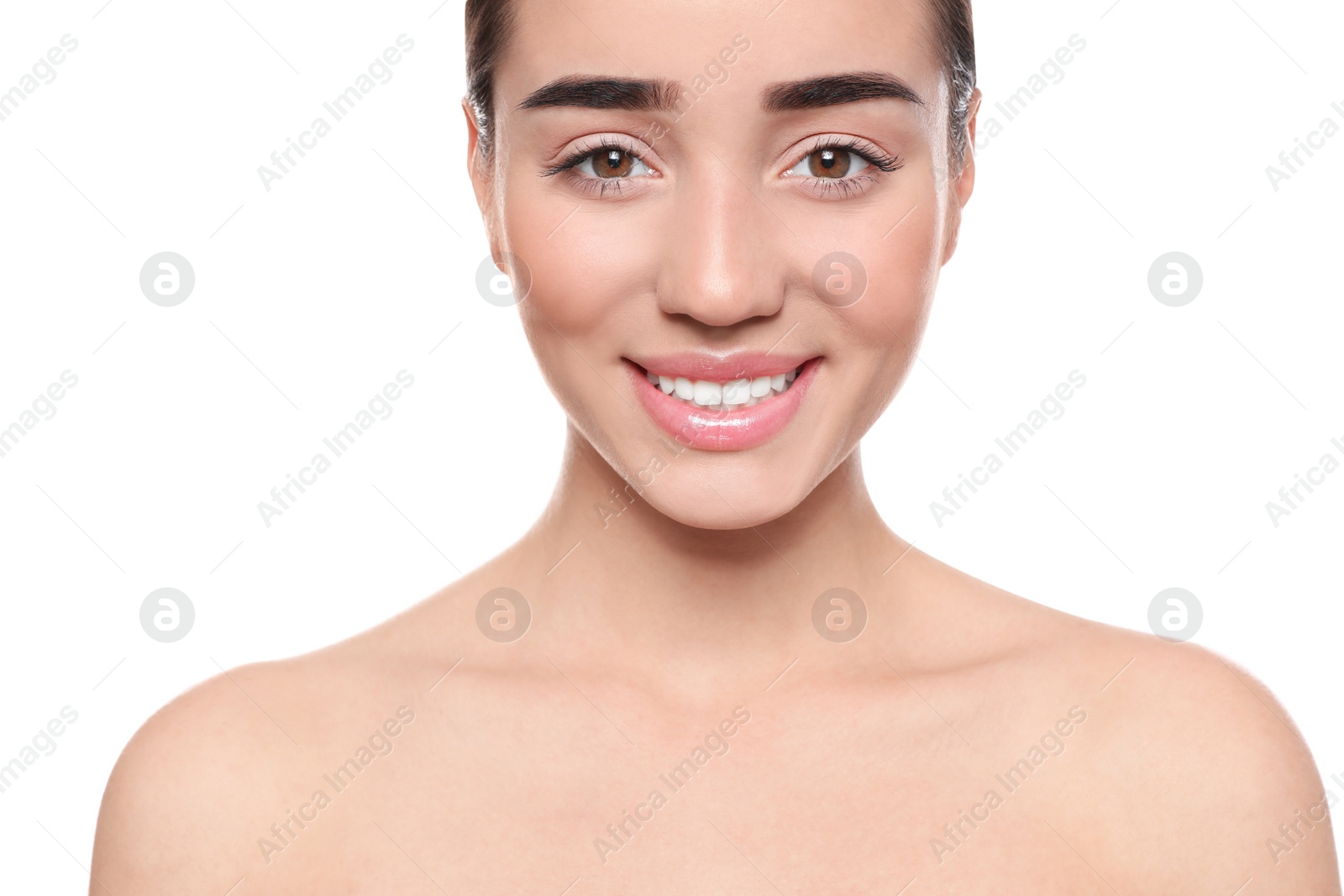 Photo of Portrait of young woman with beautiful face against white background