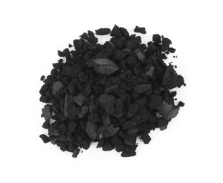 Photo of Pile of crushed activated charcoal pills on white background, top view. Potent sorbent