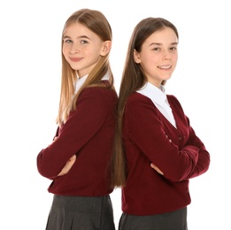 Portrait of teenage girls in school uniform on white background