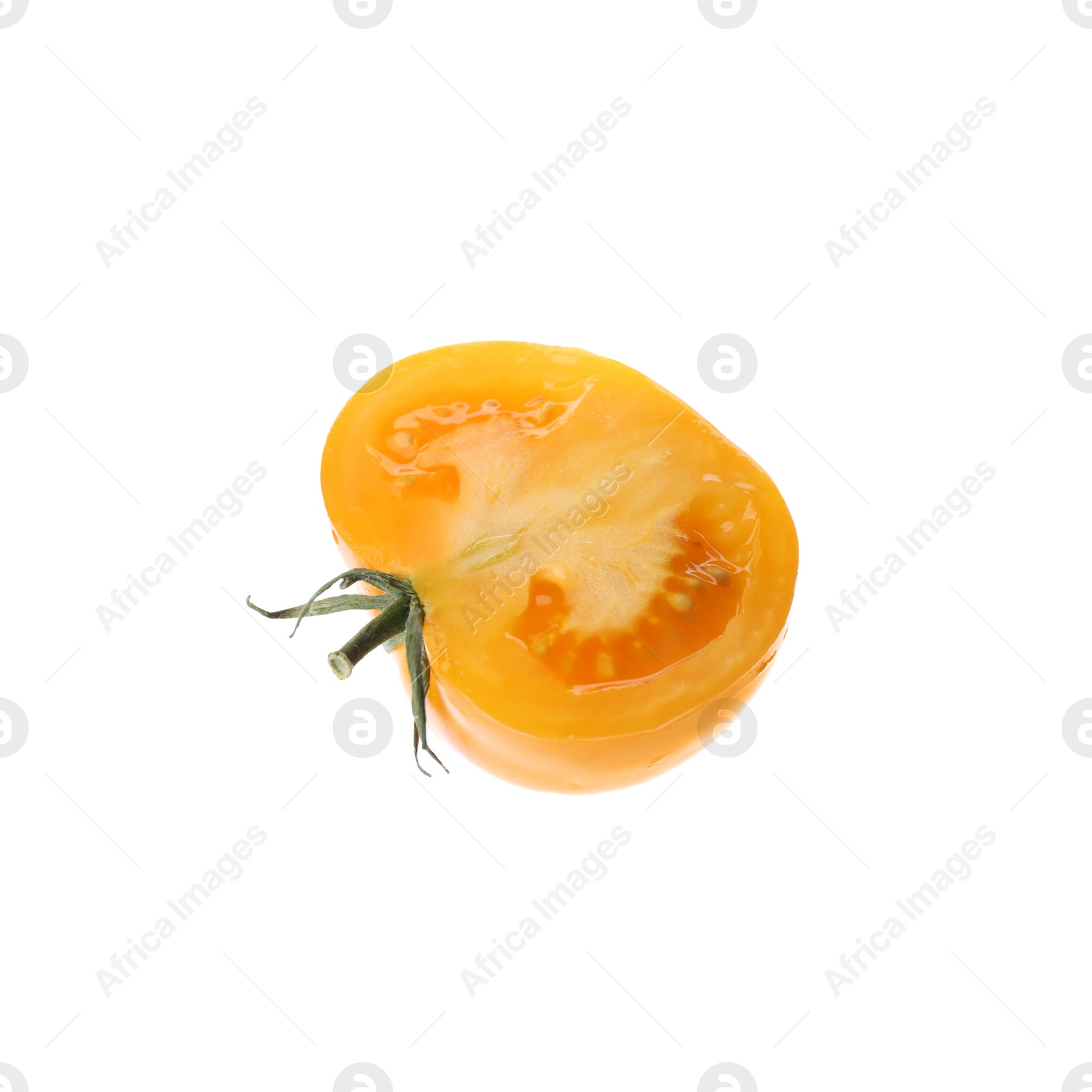 Photo of Piece of delicious ripe yellow tomato isolated on white