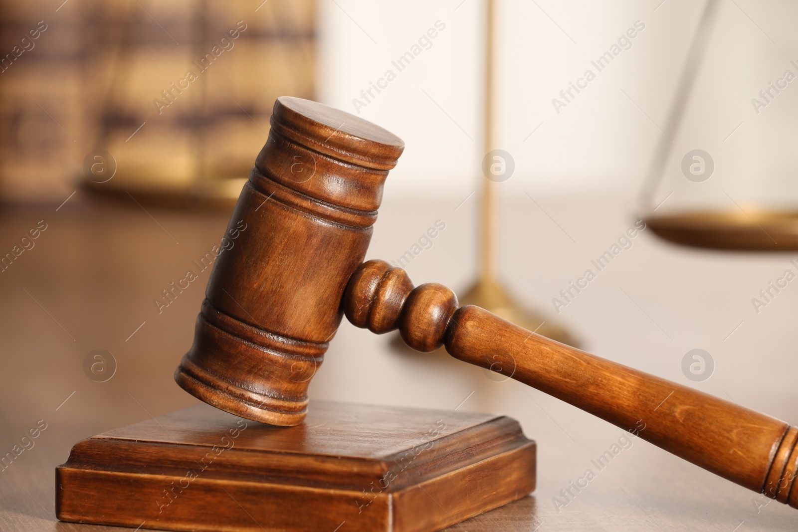 Photo of Law concept. Gavel and sound block on table, closeup