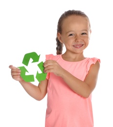 Little girl with recycling symbol on white background