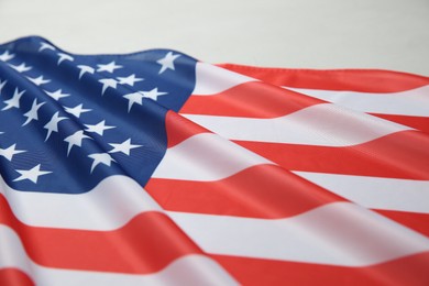 Photo of Flag of USA on white table, closeup