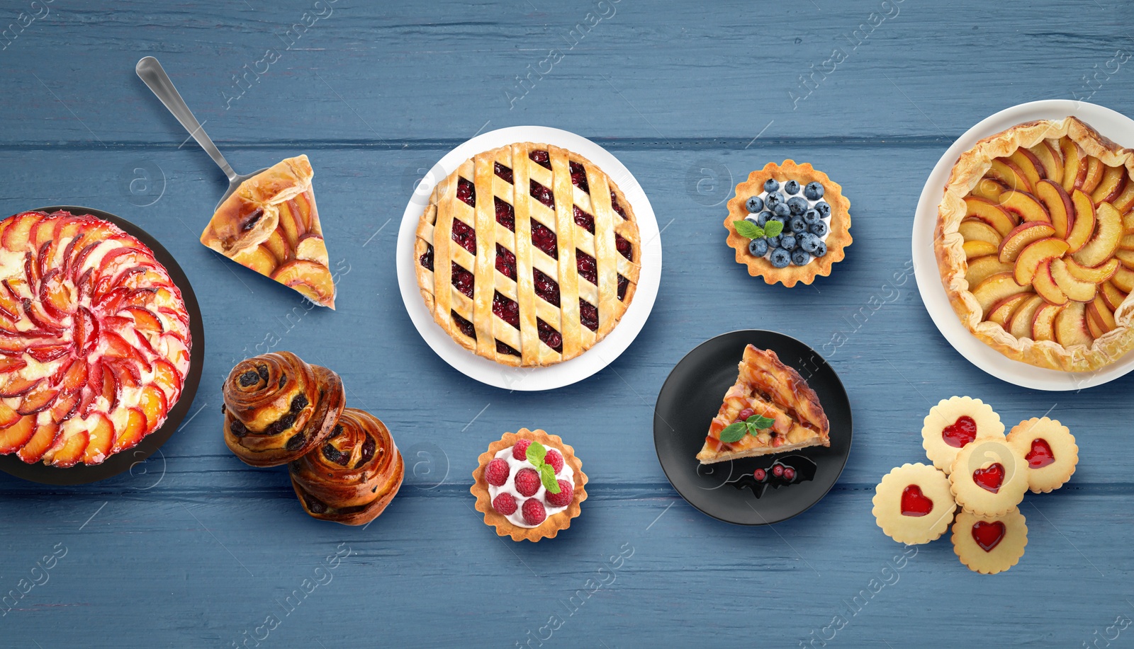 Image of Flat lay composition with different delicious pies on blue wooden table. Banner design