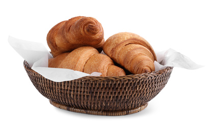 Photo of Tasty croissants in wicker bowl isolated on white