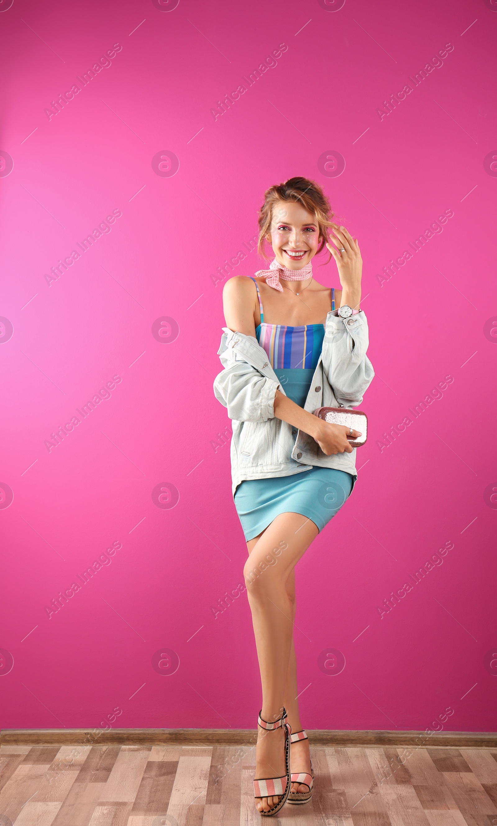 Photo of Beautiful young woman posing on color background. Summer fashion