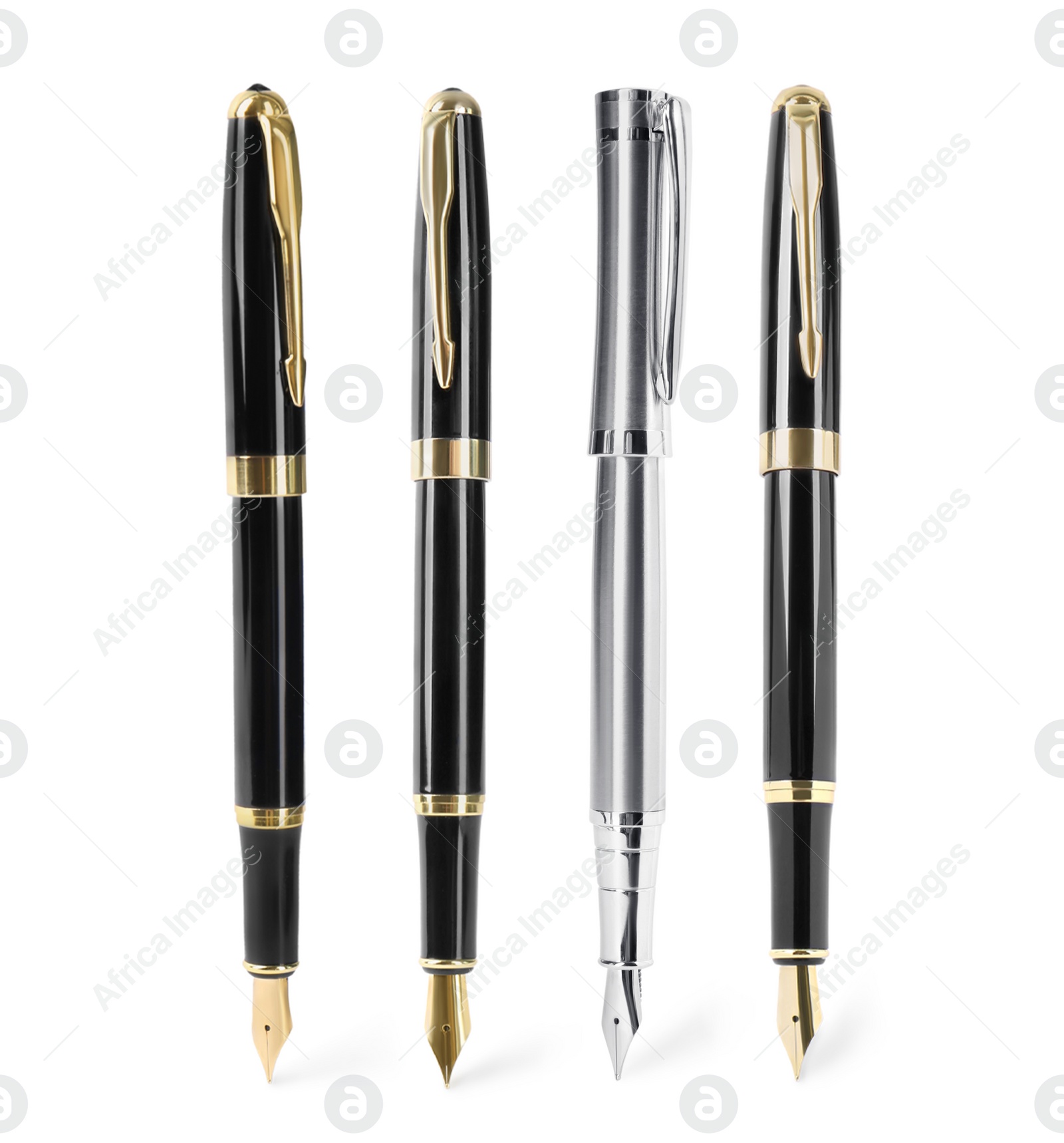 Image of Set of fountain pens on white background