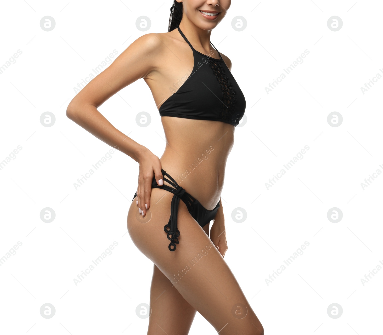 Photo of Sexy young woman in stylish swimsuit isolated on white, closeup. Beach body goal